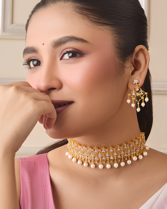 Elegant pearl choker and earrings set styled with timeless ethnic charm
