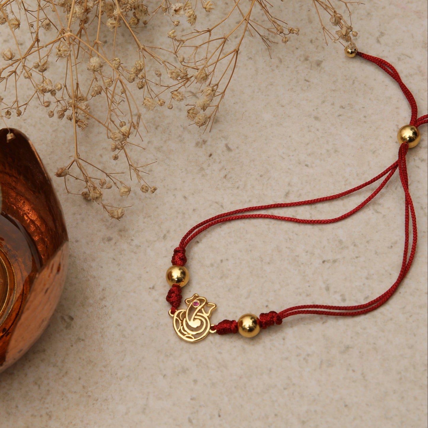 Shree Ganesha Gold Plated Silver Rakhi