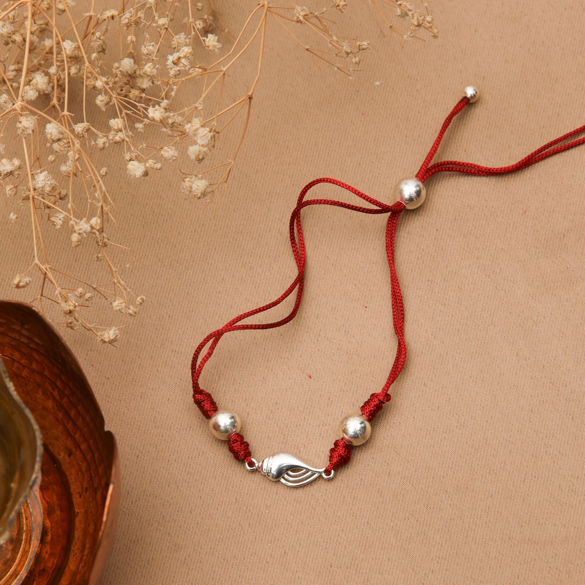 Divya Shankh Silver Rakhi