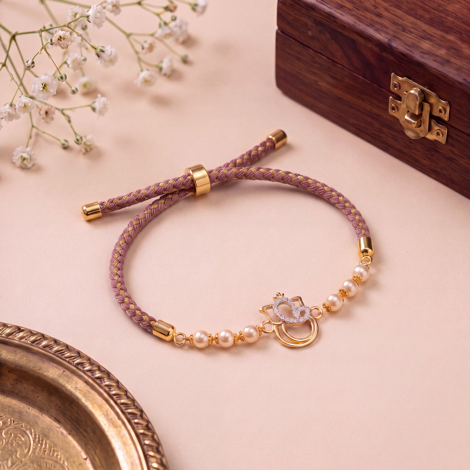 Ganesha Gold Plated Silver Rakhi